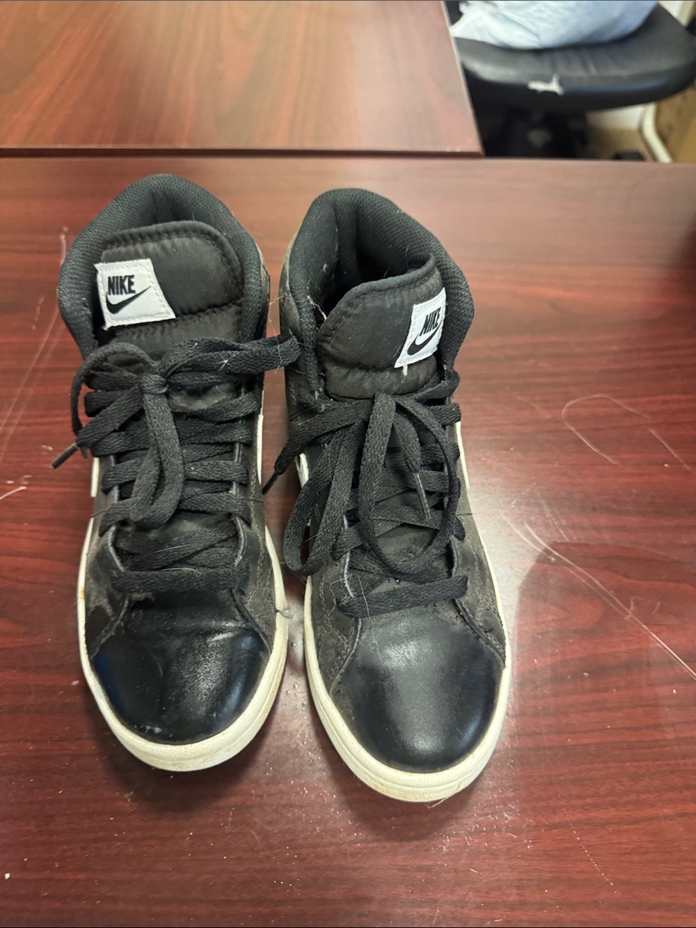 Nike women’s Black High-Top Sneakers with White Logos